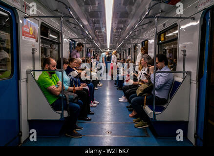 May 30, 2019, Moscow, Russia. Passengers in the Moscow subway car. Stock Photo