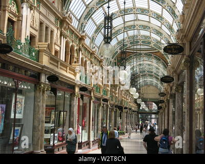 The Victorian County Arcade is one of several luxury shopping destinations in Leeds, with ornate architecture to match the elegant shops. Stock Photo