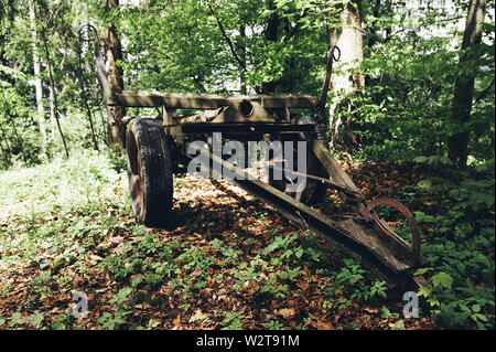old tractor trailer in the forest Stock Photo