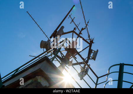 Telecommunication mast with antennas on top of lookout tower, Karoly-kilato, Sopron, Hungary Stock Photo