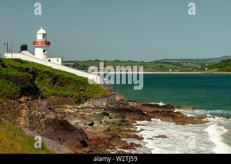 Lighthouses Ireland the Youghal Victorian Lighthouse and rocky coastline at low tide at the River Blackwater mouth in Youghal, County Cork, Ireland Stock Photo
