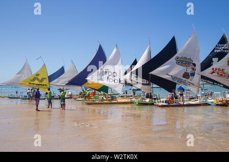 Porto de Galinhas, Brazil - August 22, 2016: Jangada boats for rent at Porto de Galinhas beach, Pernambuco, Brazil Stock Photo