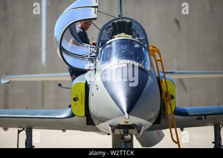 Boboc, Romania - May 22, 2019: Mechanics attend IAR 99 Soim (Hawk) advanced trainer and light attack airplane, used as jet trainer of the Romanian Air Stock Photo
