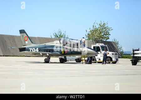 Boboc, Romania - May 22, 2019: Mechanics attend IAR 99 Soim (Hawk) advanced trainer and light attack airplane, used as jet trainer of the Romanian Air Stock Photo