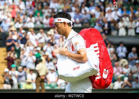 Wimbledon, UK. 10th July, 2019. Kei Nishikori of Japan walks on to the court prior to the men's singles quarter-final match of the Wimbledon Lawn Tennis Championships against Roger Federer of Switzerland at the All England Lawn Tennis and Croquet Club in London, England on July 10, 2019. Credit: AFLO/Alamy Live News Stock Photo