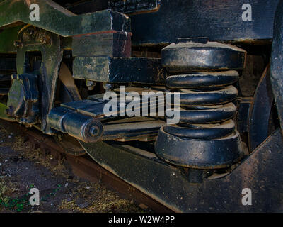 up close of a abandoned train suspension with leaf springs Stock Photo