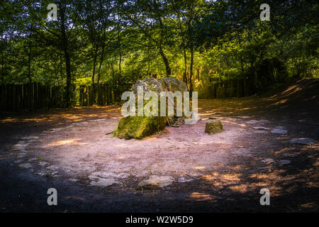 Merlin's grave or tomb or burial place, forest of Brocéliande landmark, Paimpont, Brittany, France. Stock Photo