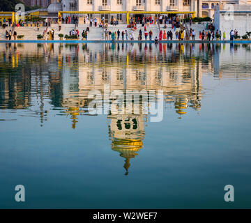 NEW DELHI, INDIA - CIRCA NOVEMBER 2018: Reflection of the Gurudwara Bangla Sahi also known as Sikh house of worship in Delhi. This is oone of the most Stock Photo