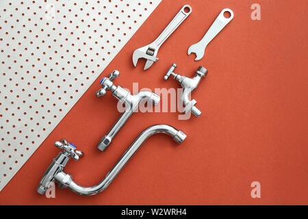Set of plumbing tools and items on color background Stock Photo