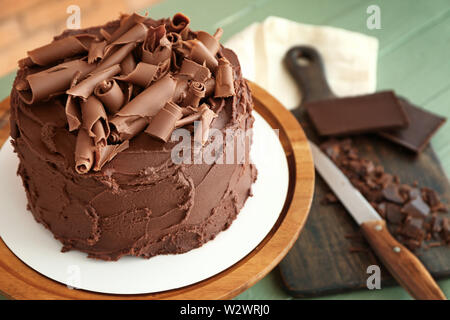 Tasty chocolate cake on stand Stock Photo