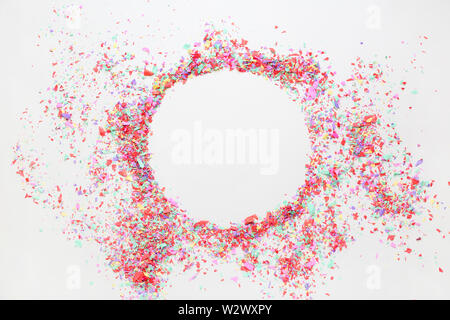 Frame made of colorful confetti on light background Stock Photo
