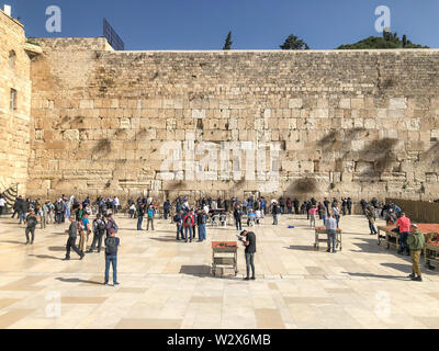 JERUSALEM, ISRAEL - JANUARY 22, 2019: Jewish worshipers pray at the Wailing Wall. The most holy site for Jews. The Western Wall, Wailing Wall or Kotel Stock Photo