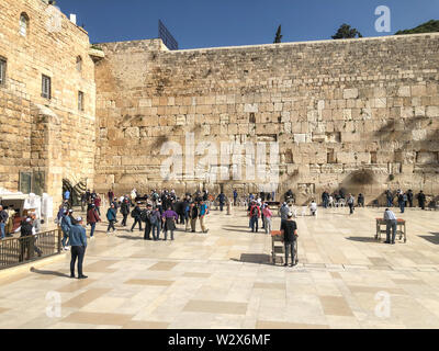 JERUSALEM, ISRAEL - JANUARY 22, 2019: Jewish worshipers pray at the Wailing Wall. The most holy site for Jews. The Western Wall, Wailing Wall or Kotel Stock Photo