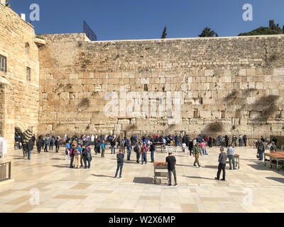 JERUSALEM, ISRAEL - JANUARY 22, 2019: Jewish worshipers pray at the Wailing Wall. The most holy site for Jews. The Western Wall, Wailing Wall or Kotel Stock Photo