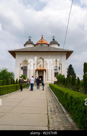 Ilfov, near Bucharest, Romania - April 30, 2019: People visiting orthodox Cernica Monastery.