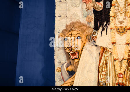 Kolkata India October 2018 - Close up portrait of Screaming horror face of King Bengal Tiger Head. Ghost cruel, Scary halloween shot in Durga Puja fes Stock Photo