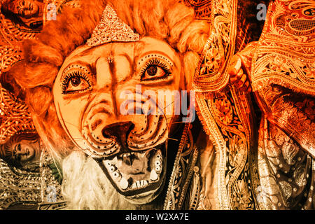 Kolkata India October 2018 - Close up portrait of Screaming horror face of King Bengal Tiger Head. Ghost cruel, Scary halloween shot in Durga Puja fes Stock Photo