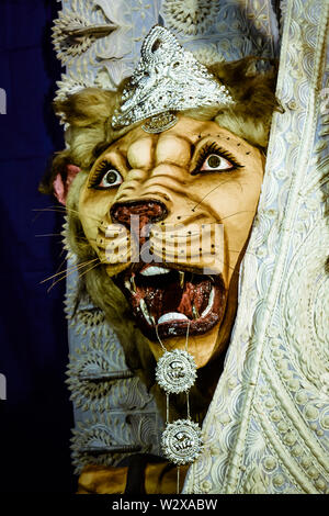 Kolkata India October 2018 - Close up portrait of Screaming horror face of King Bengal Tiger Head. Ghost cruel, Scary halloween shot in Durga Puja fes Stock Photo