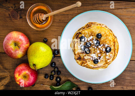 Sweet american pancakes with berries and fruits Stock Photo