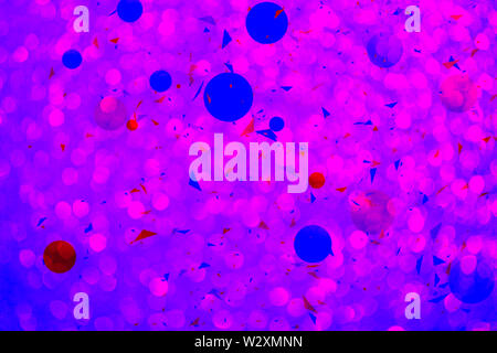 Abstract background with spheres. Multicolored bubbles on pink background with bokeh defocused lights and shadow. Illustration of balls textured as pa Stock Photo