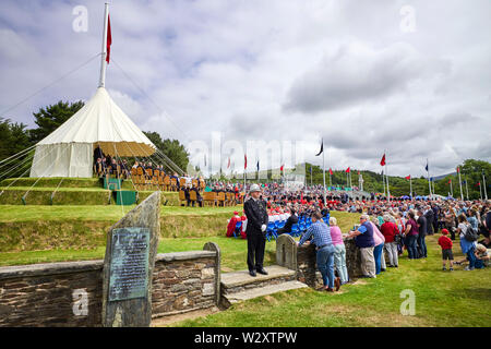 Britain's Queen Elizabeth II holds her handbag as she presides over the  Tynwald ceremony on the Isle of Man Stock Photo - Alamy