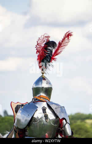 A brave medieval knight wering a helmet Stock Photo
