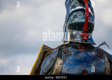 A brave medieval knight wering a helmet Stock Photo