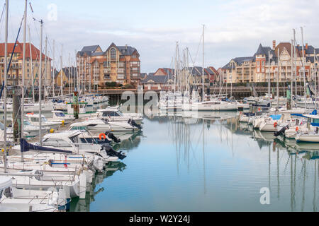 Dives-Sur-Mer, France - January 3, 2019: the harbour, boats, and buildings at dives-sur-mer Stock Photo