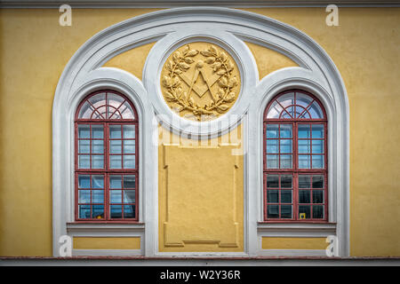 A decorative art deco style window on a building in the swedish town of Karlskrona. Stock Photo