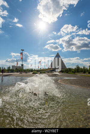 Center of capital of Kazakhstan - Astana./Astana/Astana, Kazakhstan - jule 4, 2014: Fountain near of the “Palace of Peace and Reconciliation” Stock Photo