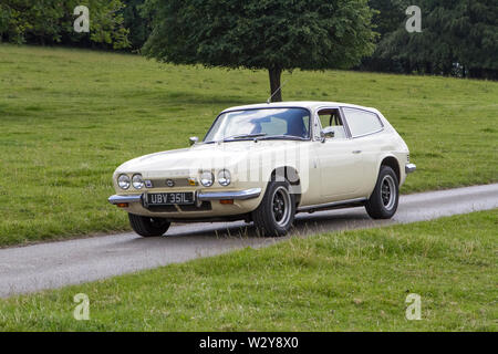 1972 70s seventies white Reliant Scimitar GTE; Vintage classic restored vehicles at the Leighton hall car festival in Carnforth, Lancaster, UK Stock Photo