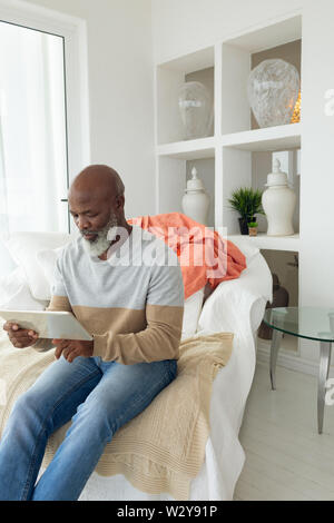 Man using digital tablet Stock Photo