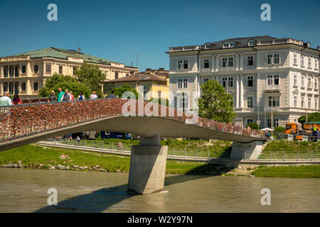 Famous bridge Makartsteg with a lot of loving lockers crossing the river Salzach in Salzburg Stock Photo