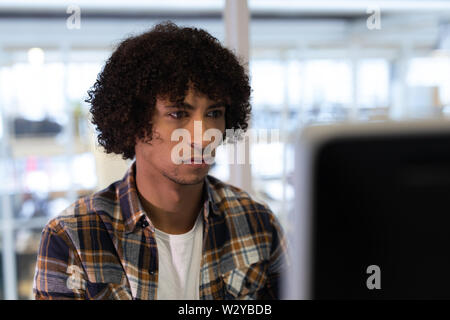 Male graphic designer working on computer Stock Photo