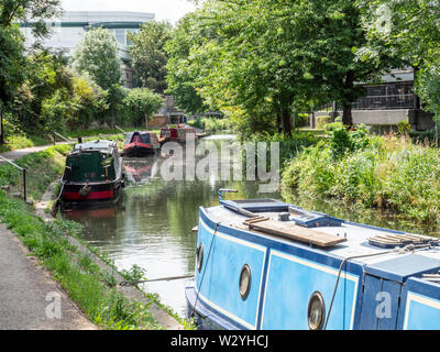 Canal boats, or narrowboats or longboats moored at Hockerill Cut on the River Stort at Bishops Stortford Hertfordshire UK Stock Photo