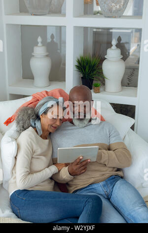 Couple using a digital tablet Stock Photo
