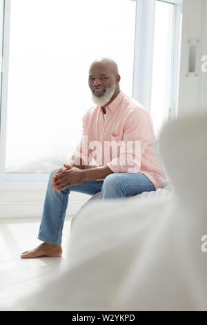 Smiling man looking the camera Stock Photo