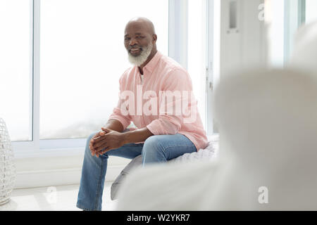 Smiling man looking the camera Stock Photo