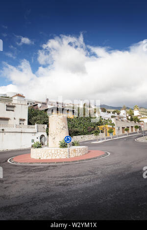 rounabout in Torremuelle, BenalmAdena with a monument to the watchtower along the coastline of spain Stock Photo