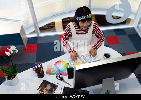 Female graphic designer working on computer Stock Photo