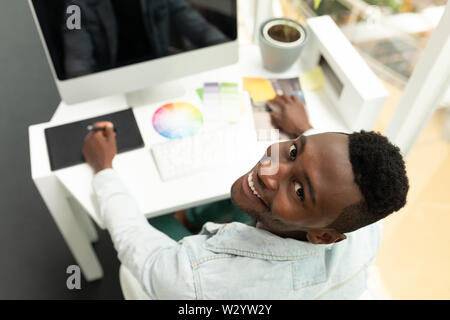 Male graphic designer using graphic tablet Stock Photo