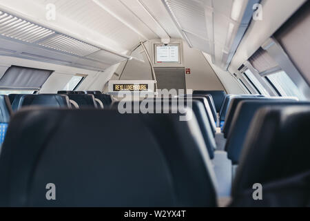 Luxembourg City, Luxembourg - May 18, 2019: Rows of seats inside empty modern line 10 train connecting Luxembourg City with the North of the country, Stock Photo