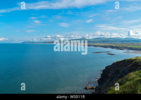 Seaside town of Borth, Ynyslas beach and Aberdyfi in the distance, Ceredigion Mid Wales UK. June 2019 Stock Photo