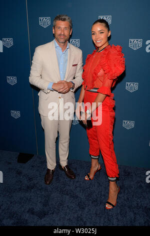 NEW YORK, NY - JULY 10: Patrick Dempsey and Olivia Culpo attend TAG Heuer Celebrates 50 Years of the iconic Monaco Timepiece at Cipriani Broadway on J Stock Photo