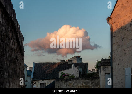 An angry storm cloud over the village of Montsoueau in the Loire Valley, France Stock Photo