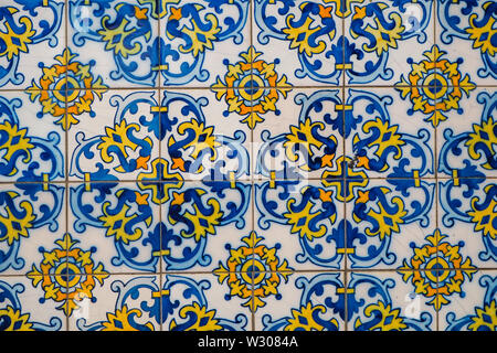 Portuguese tiles . Seamless patchwork tile with Victorian motives. Majolica pottery tile, blue and white azulejo, original traditional Portuguese and Stock Photo