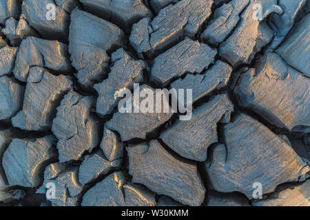 The texture of dried mud spewed from a mud volcano Stock Photo