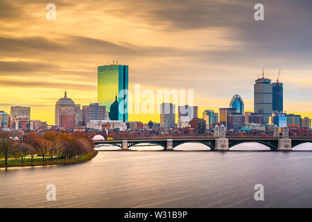 Boston, Massachusetts, USA downtown cityscape from across the Charles River at dawn.