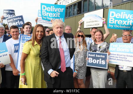 Conservative Party leadership candidate Boris Johnson arriving with Maidstone and The Weald MP Helen Grant (left) for the Tory leadership hustings in Maidstone, Kent. Stock Photo