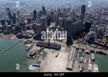 San Francisco, California, USA - September 19, 2016:  Aerial view of urban downtown buildings and waterfront docks along the Embarcadero. Stock Photo